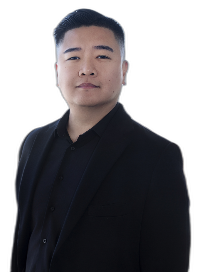 Thomas “Success” Wang in a black suit — transparent cutout portrait